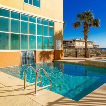 Outdoor Pool and Hot Tub at Gulf Shores Condo Rental